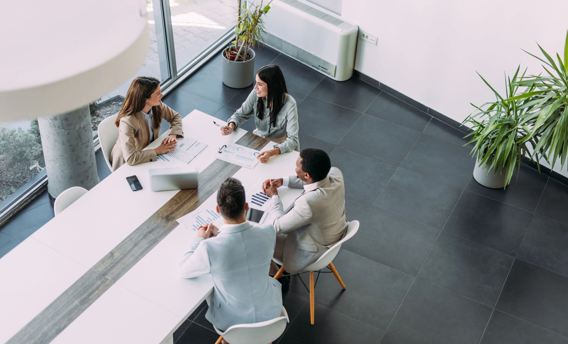 Business team collaborating around a meeting table